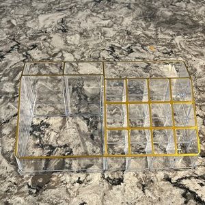 Acrylic makeup organizer.
